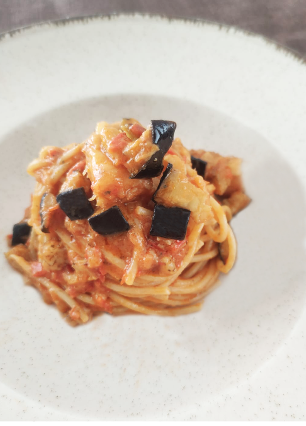 Spaghetti con baccalà e melanzane